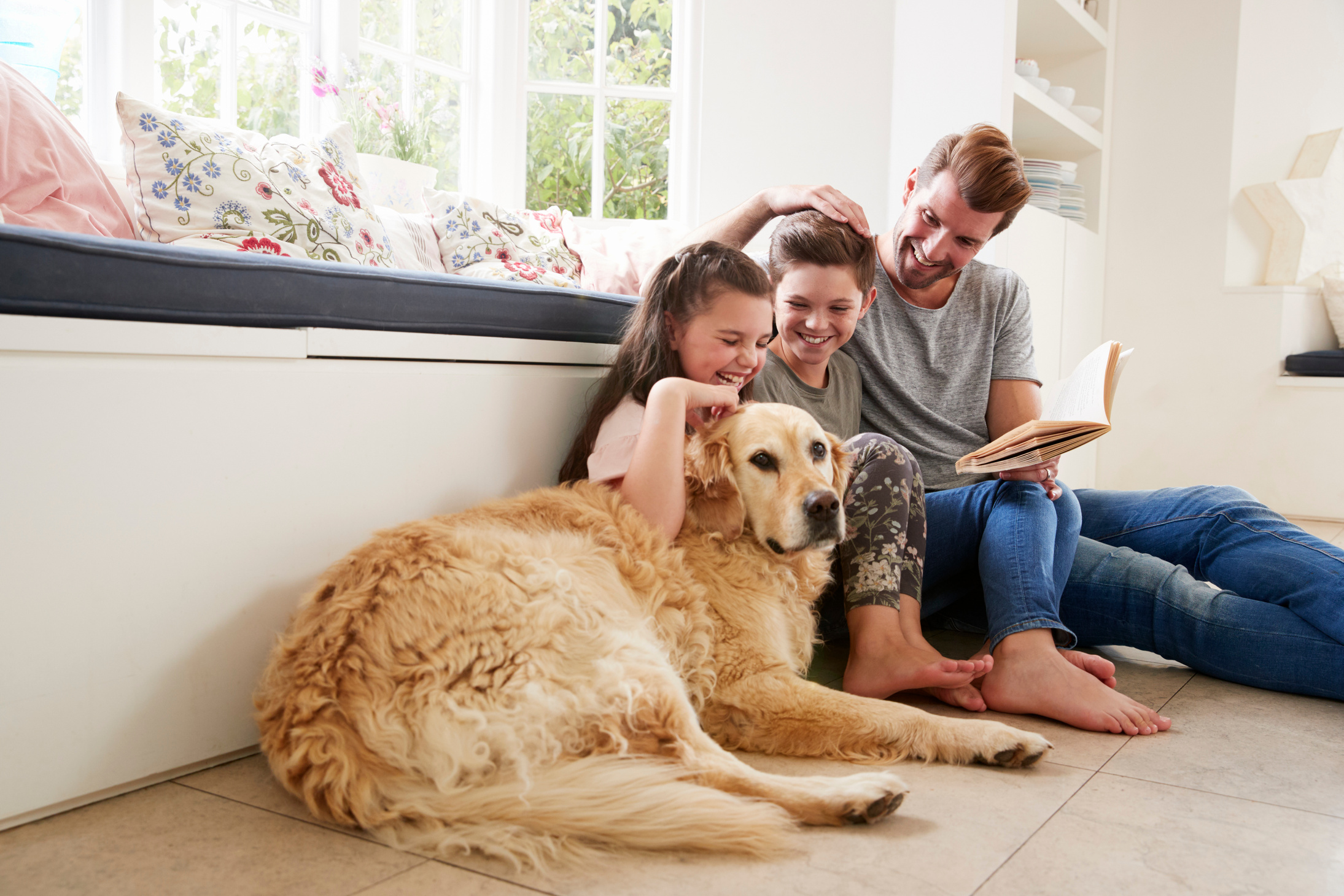 Family and Pet Dog at Home